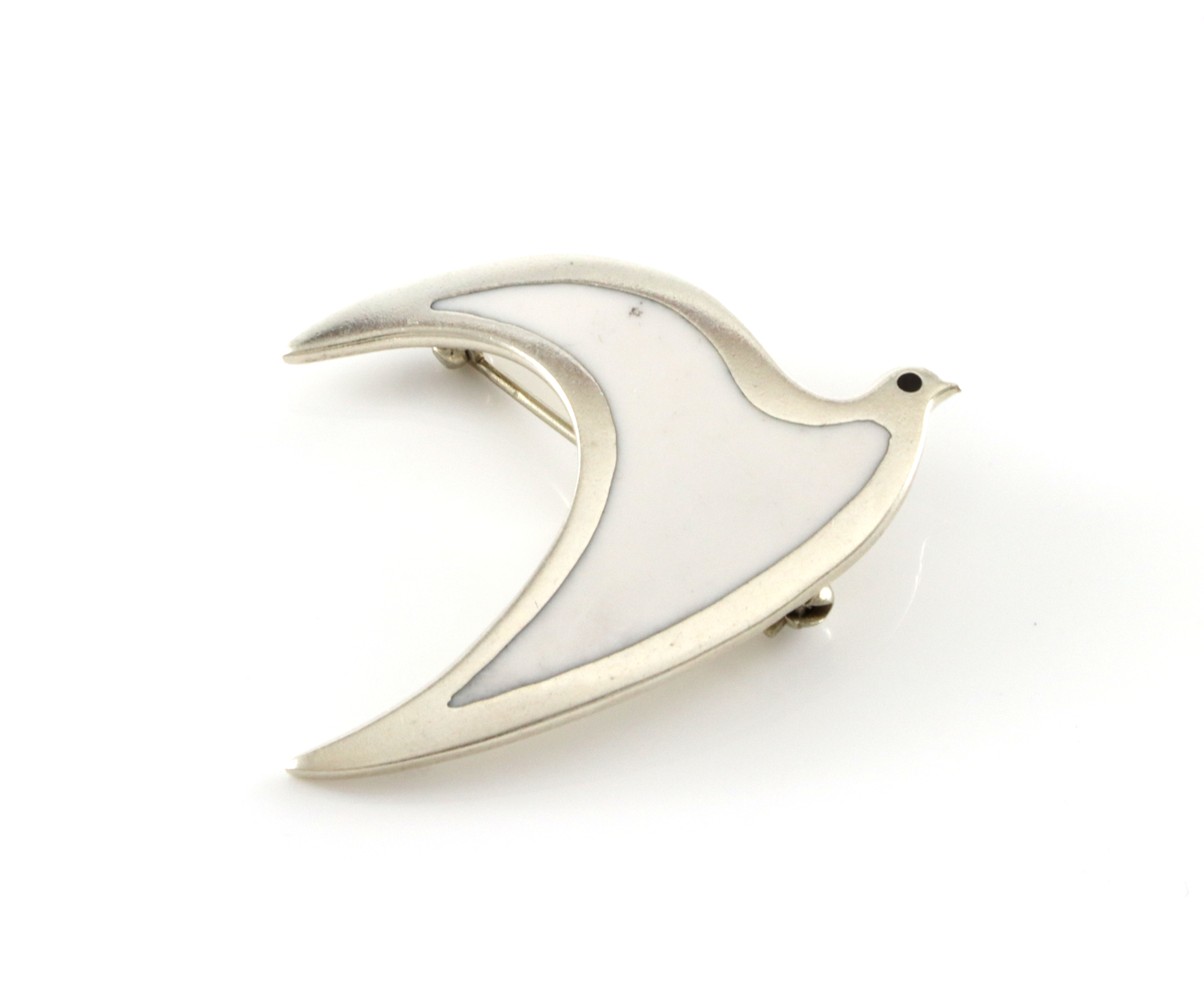 Kombinert anheng/brosje i sølv