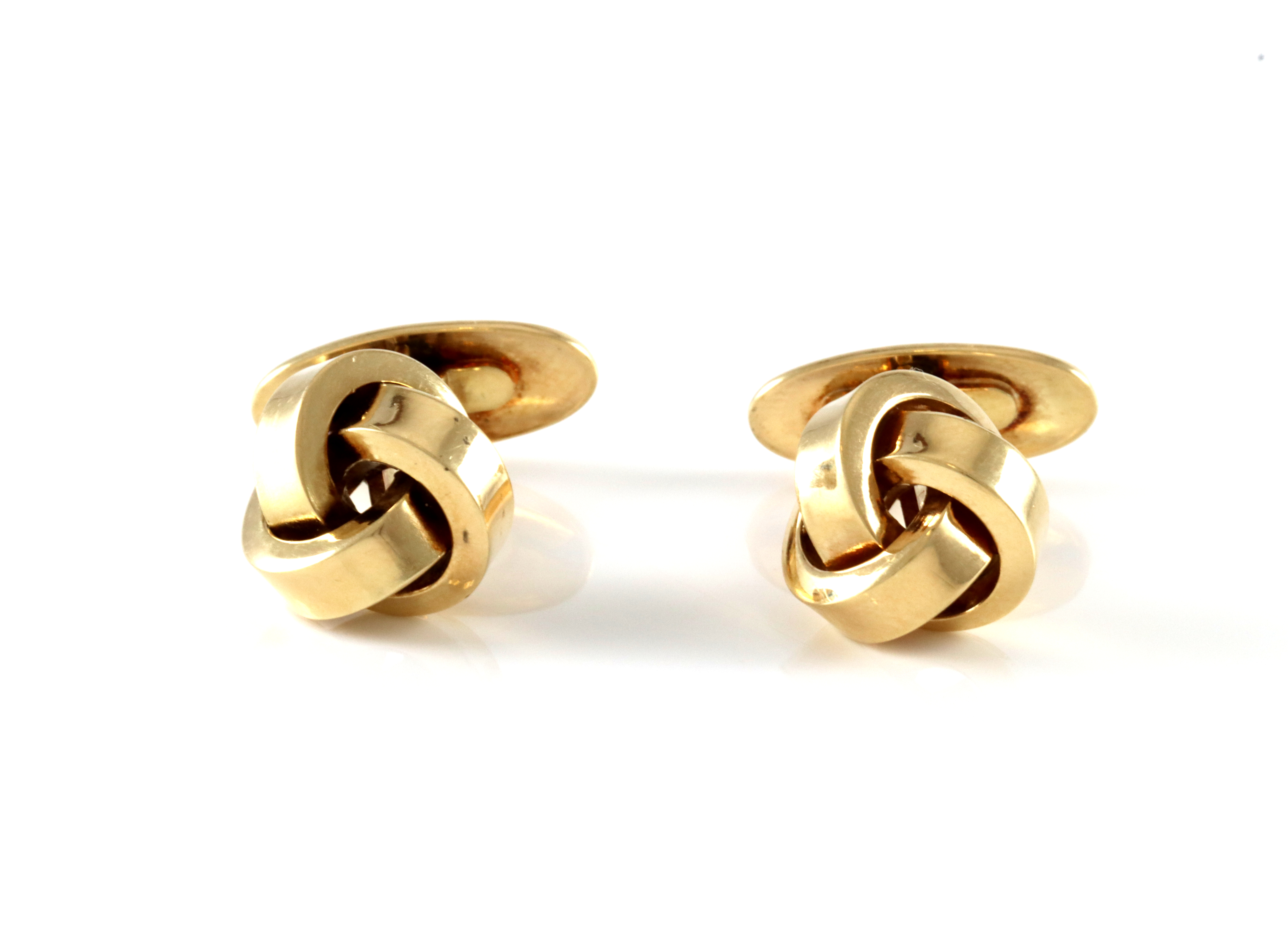 Mansjettknapper. Klassiske knuter