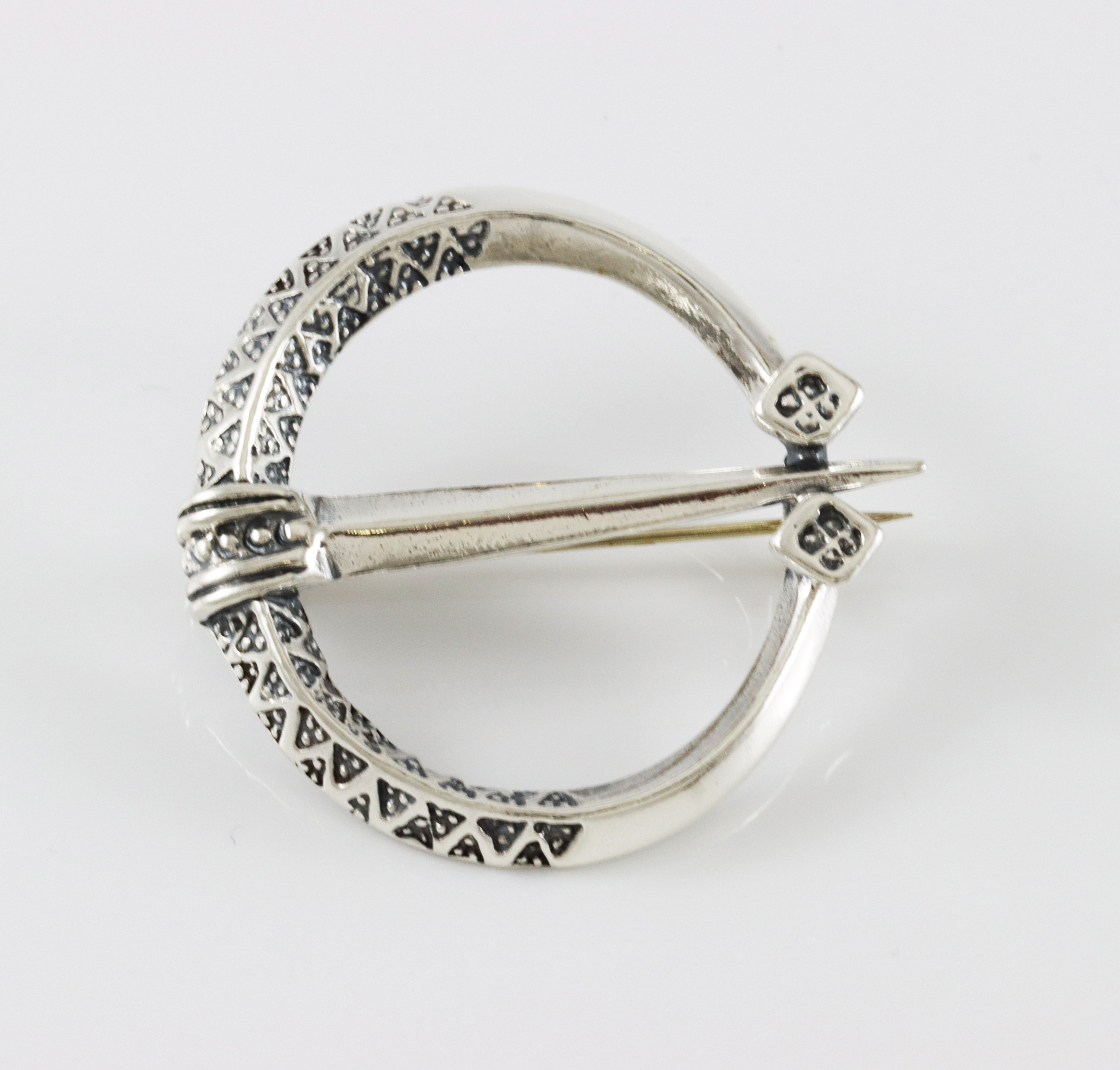 Nasjonalromantiske brosje i sølv