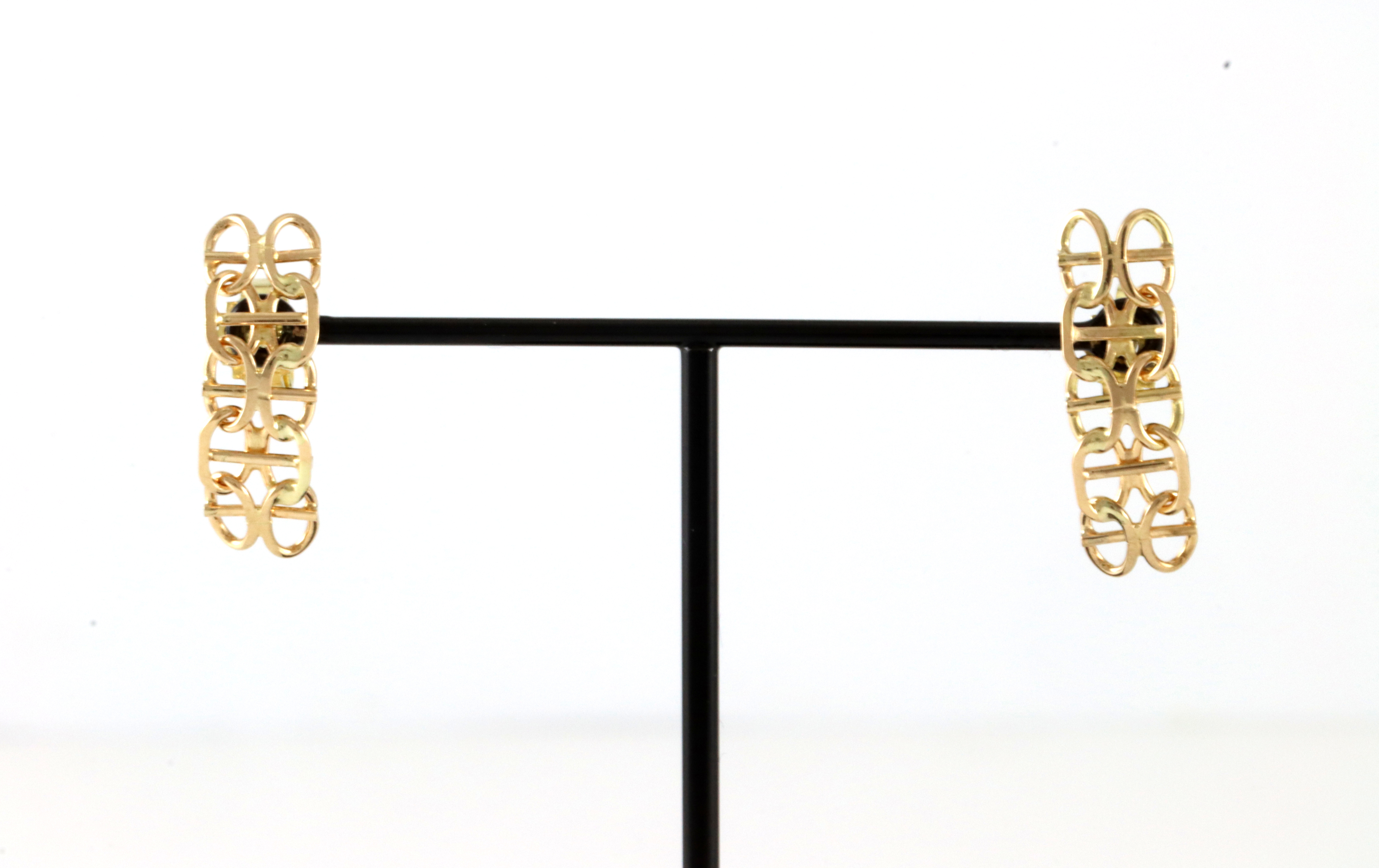 X med stav øredobber