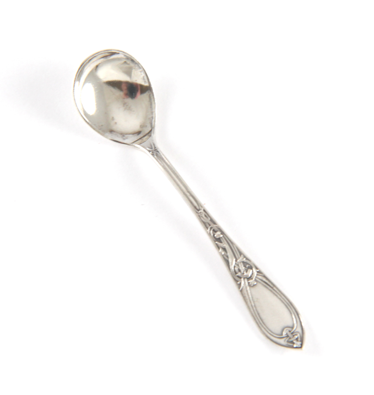 Dragemønster saltskje i sølv.