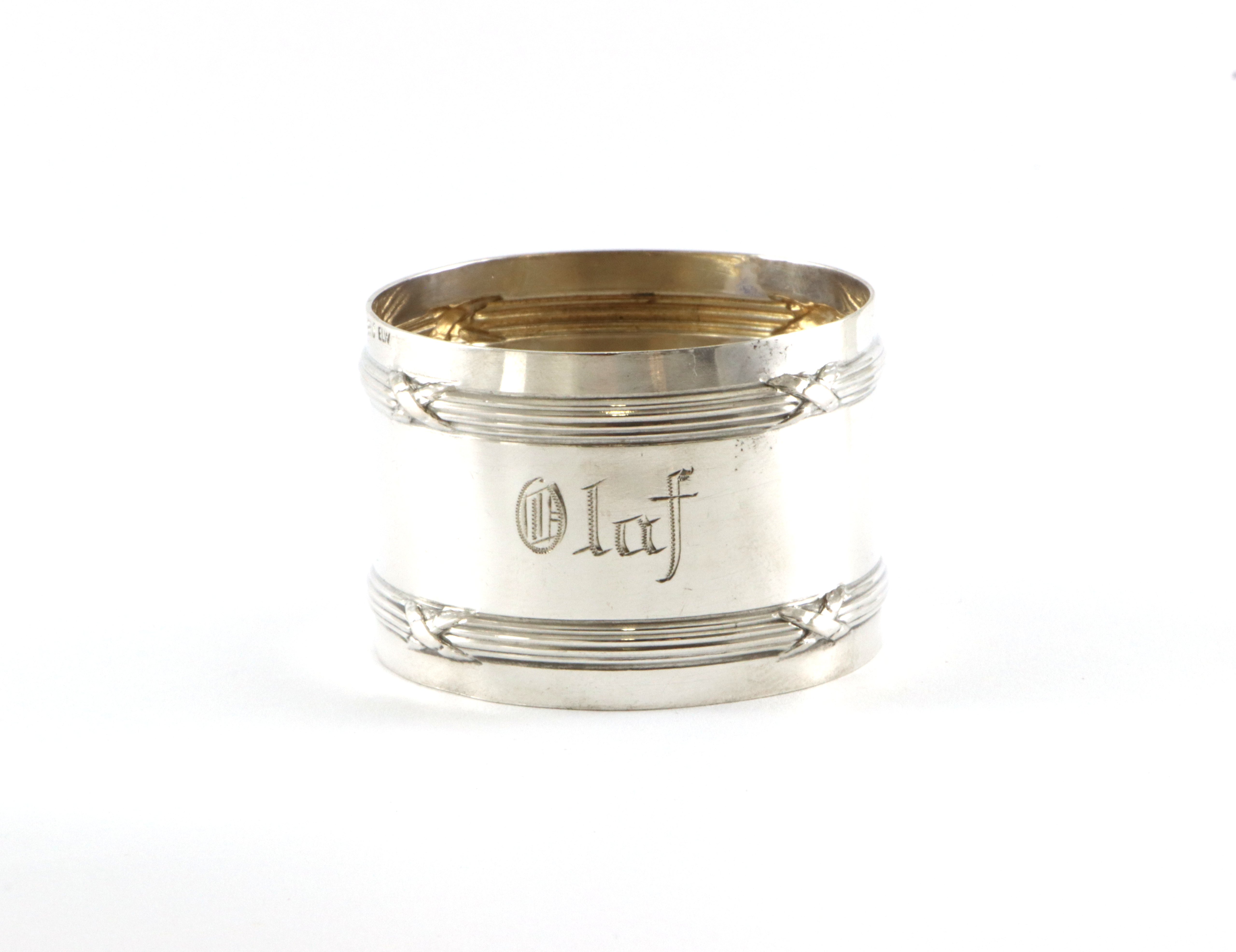 Graverte serviettringer i sølv