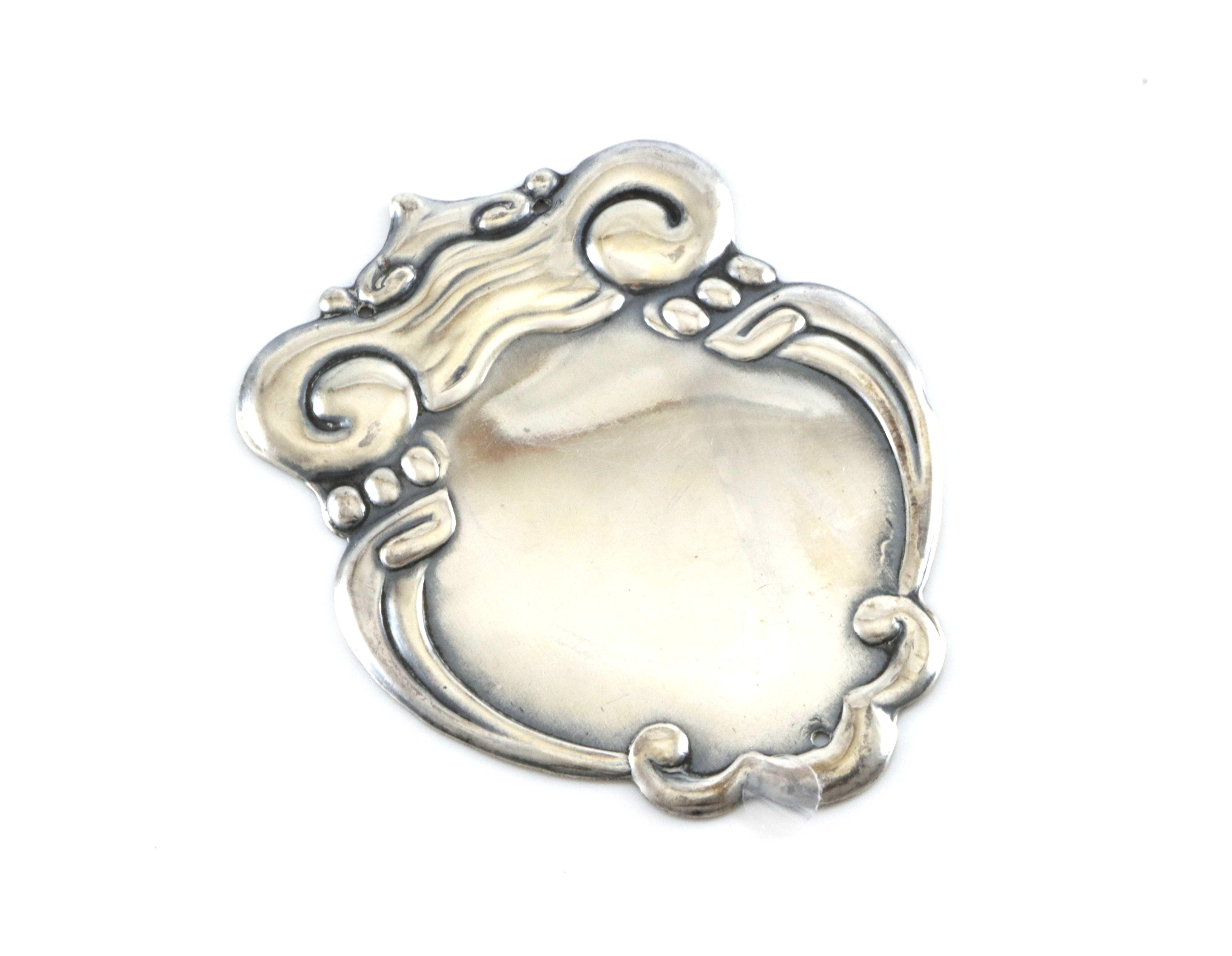 Frakkeskjold i sølv