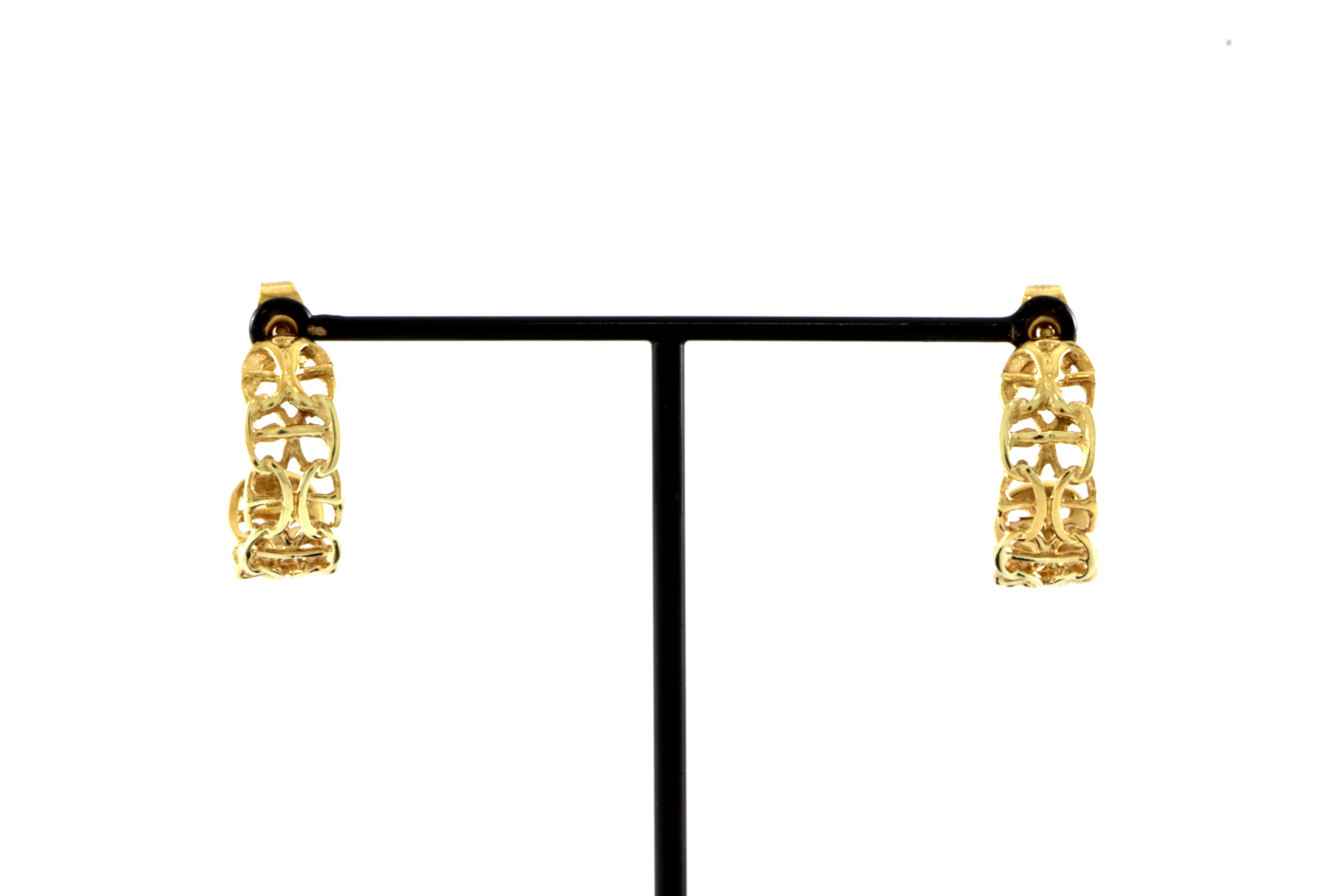 X med stav øreringer