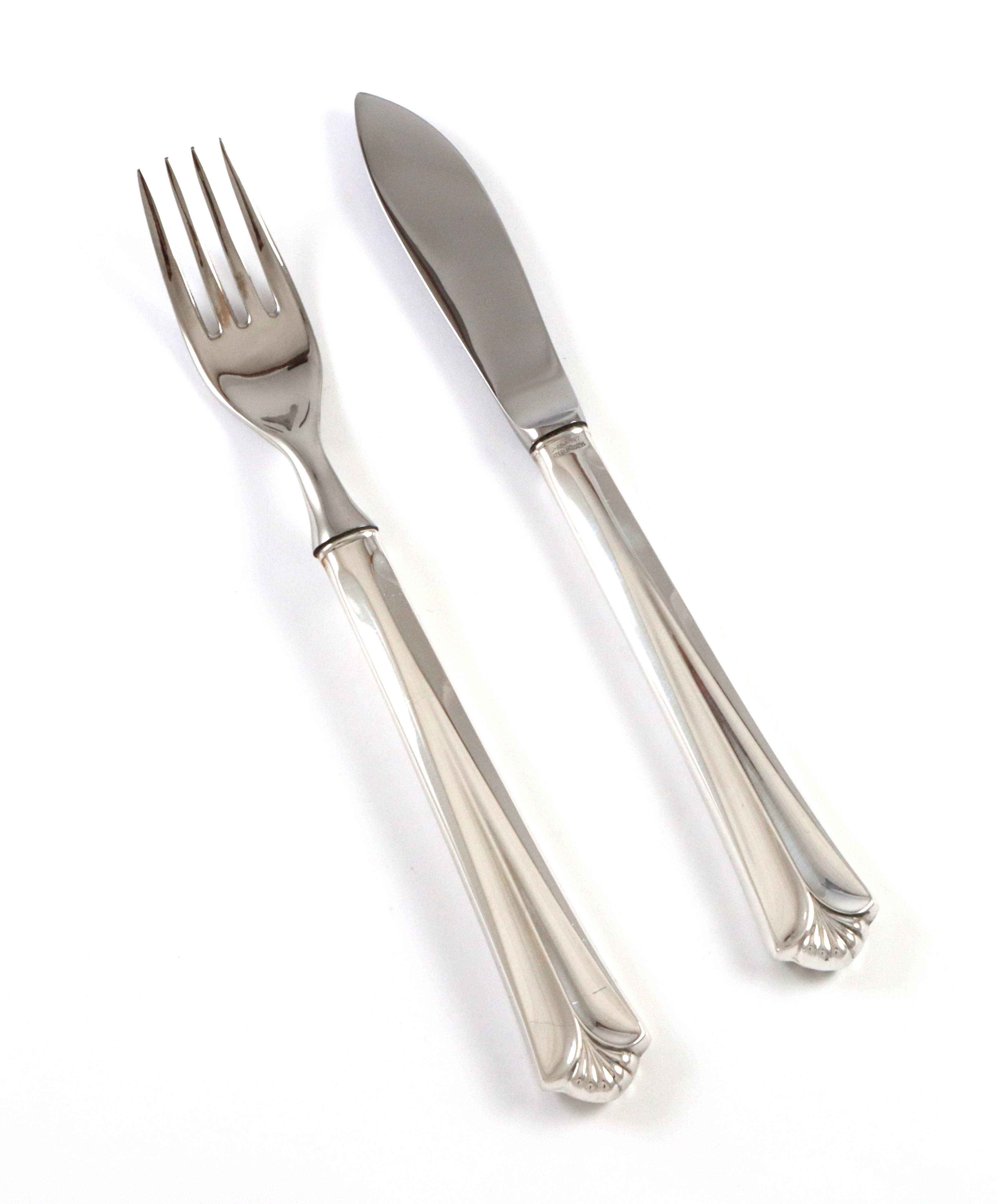 Rådhus med vifte fiskebestikk i sølv.