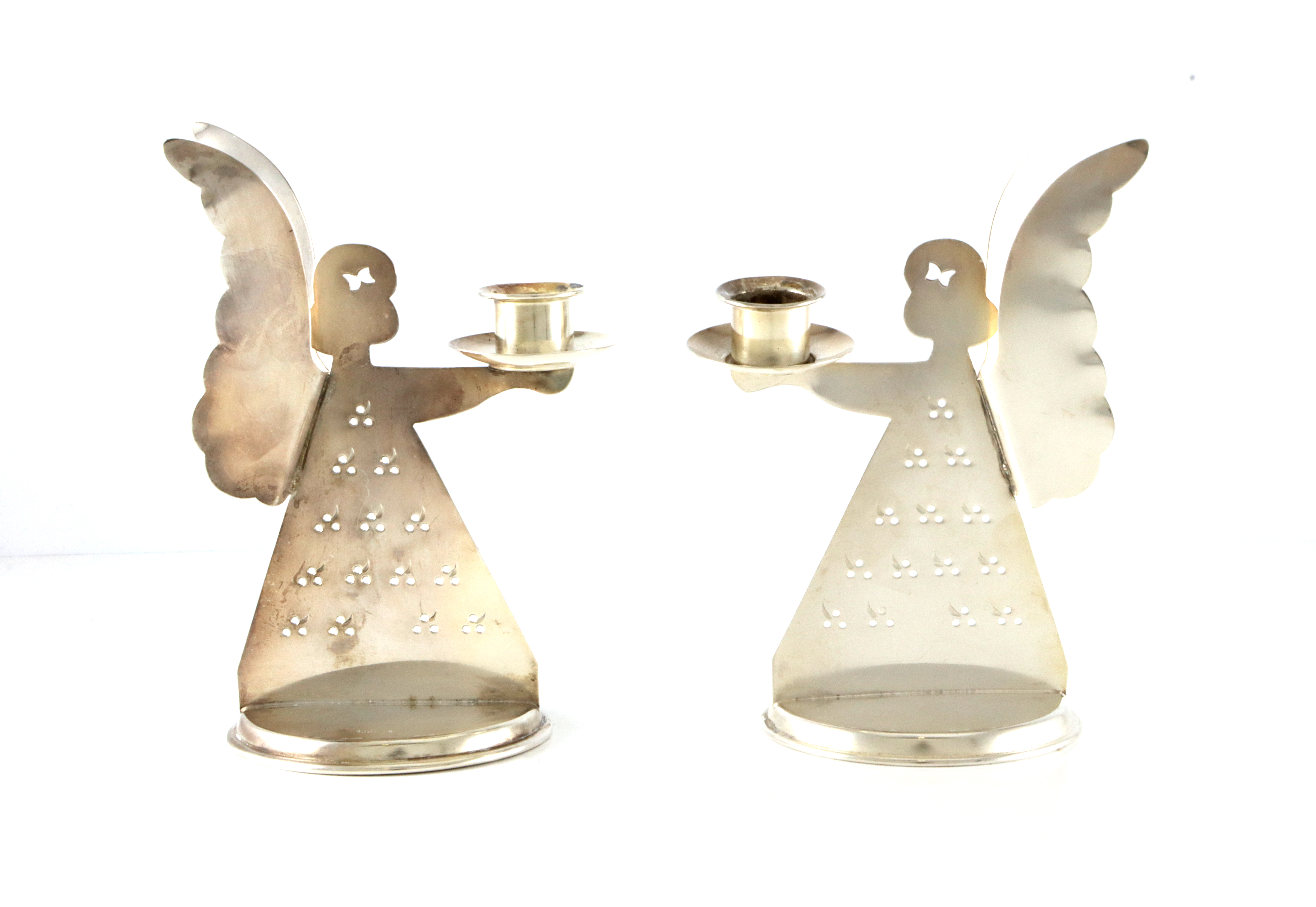 To lysestaker formet som engler