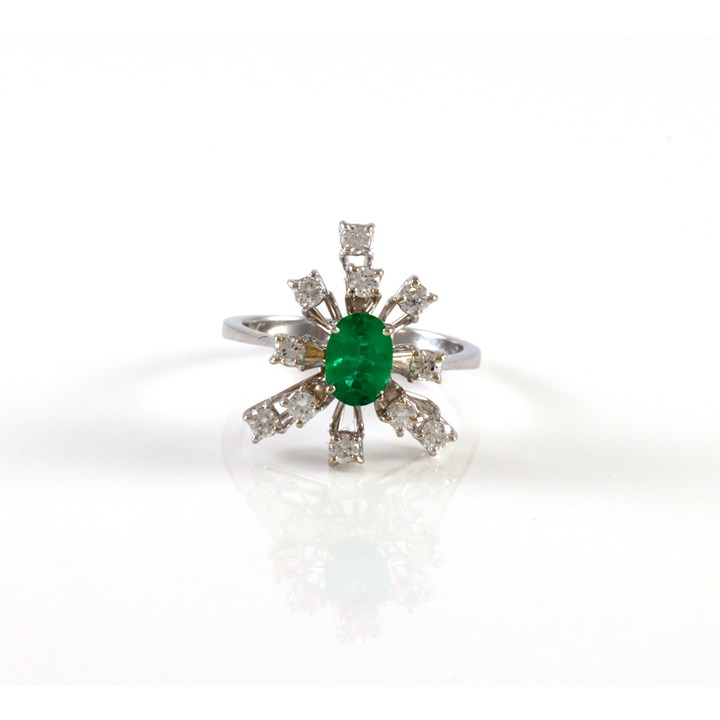 Vakker ring med smaragd og diamanter