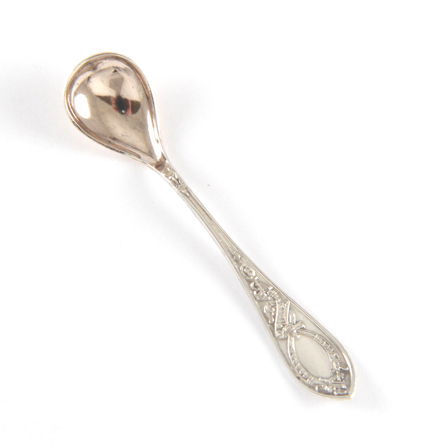 Drage saltskje i sølv.