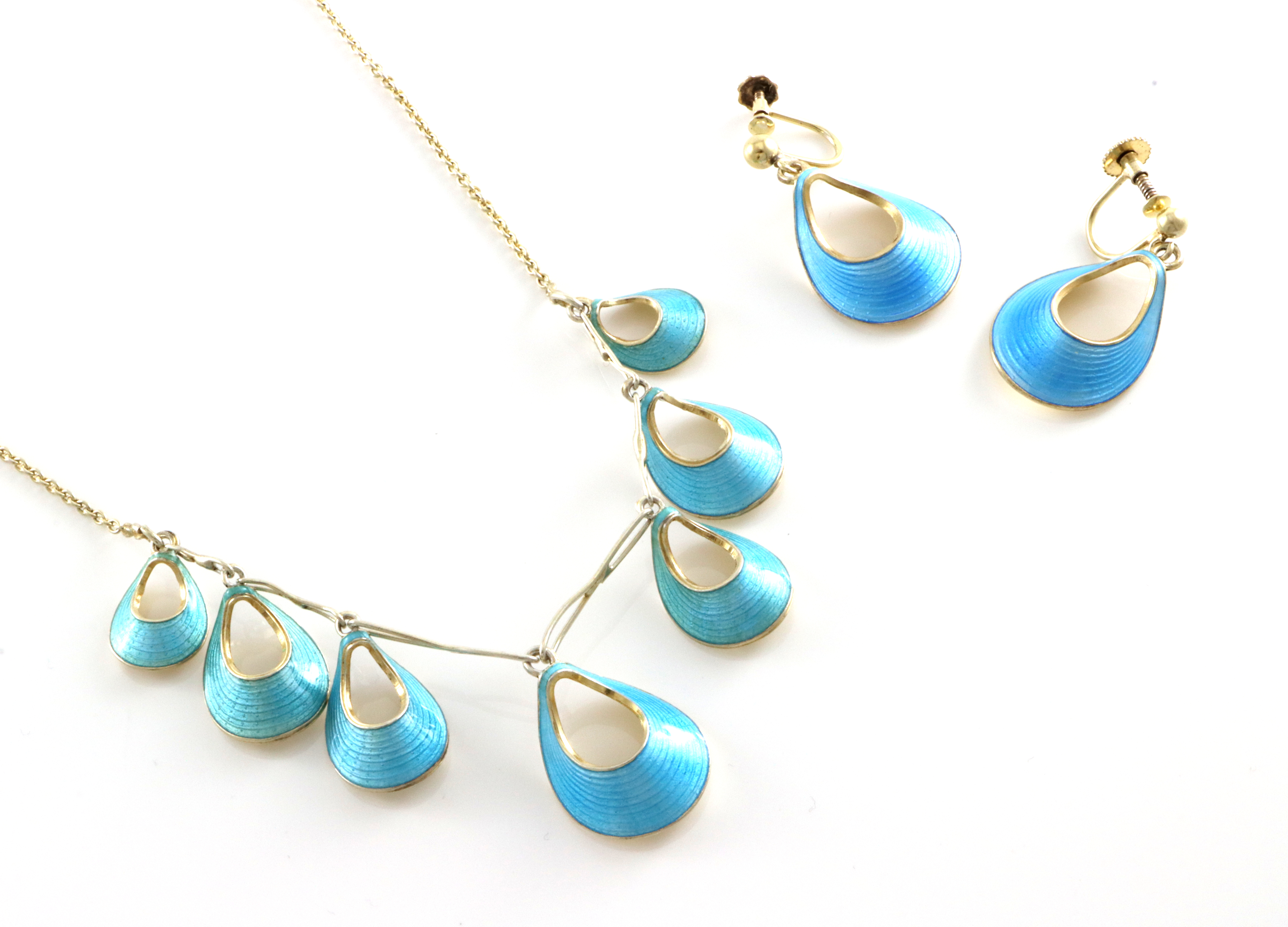 Emaljerte smykkesett i sølv