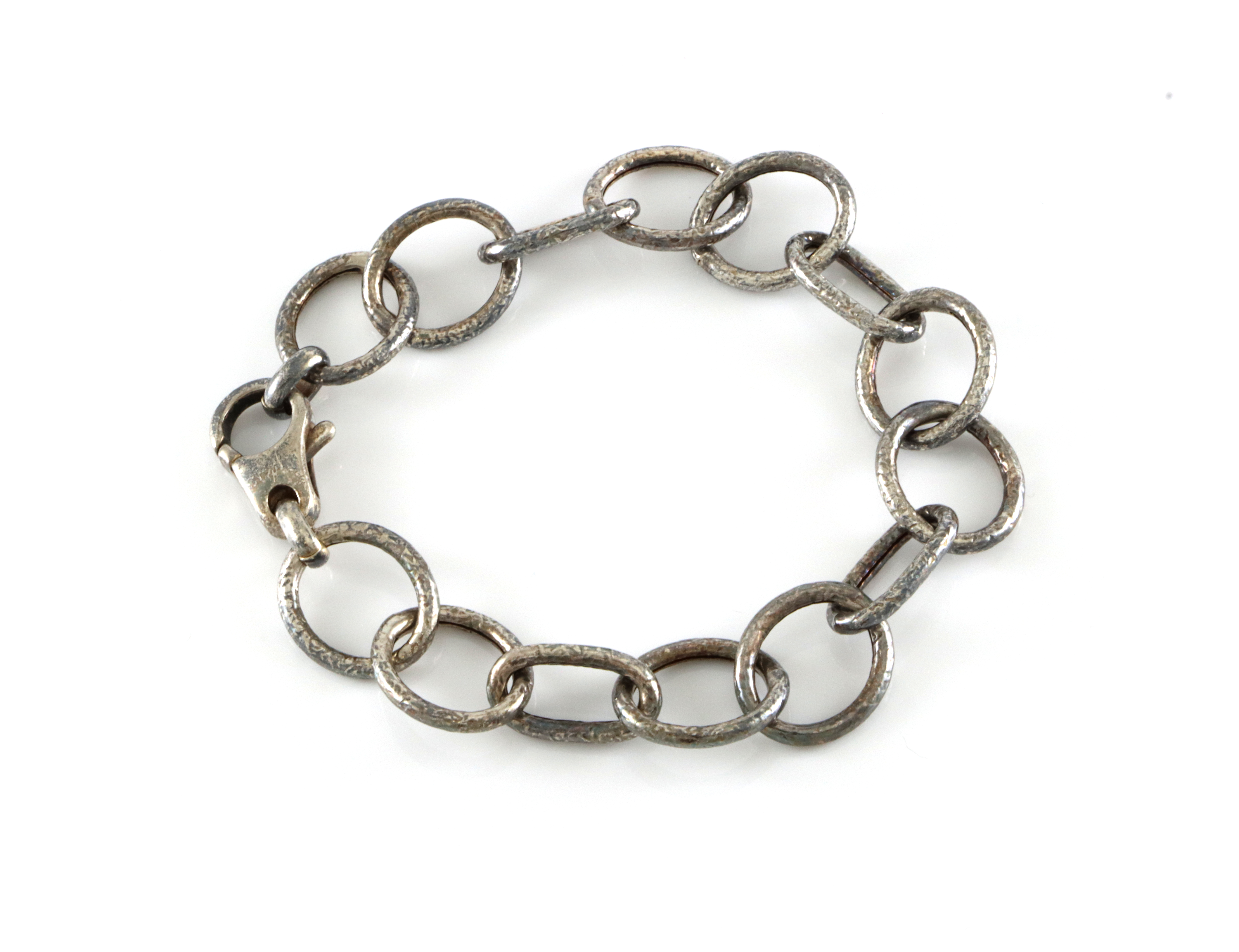 Armlenke i oksidert sølv