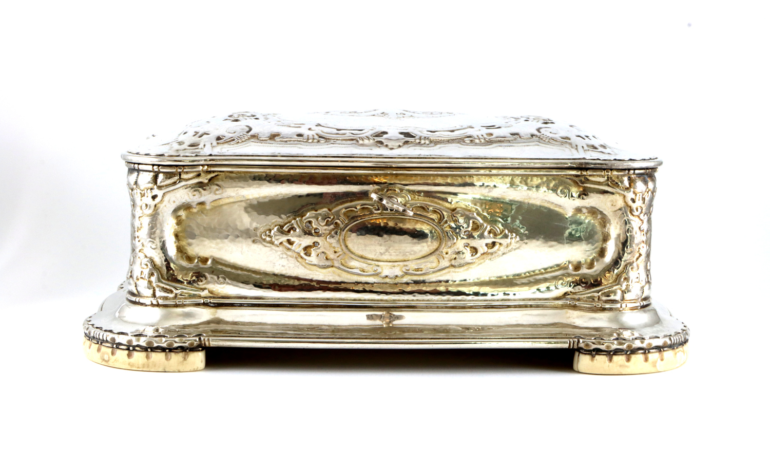 Spinnvilt David-Andersen skrin i sølv.