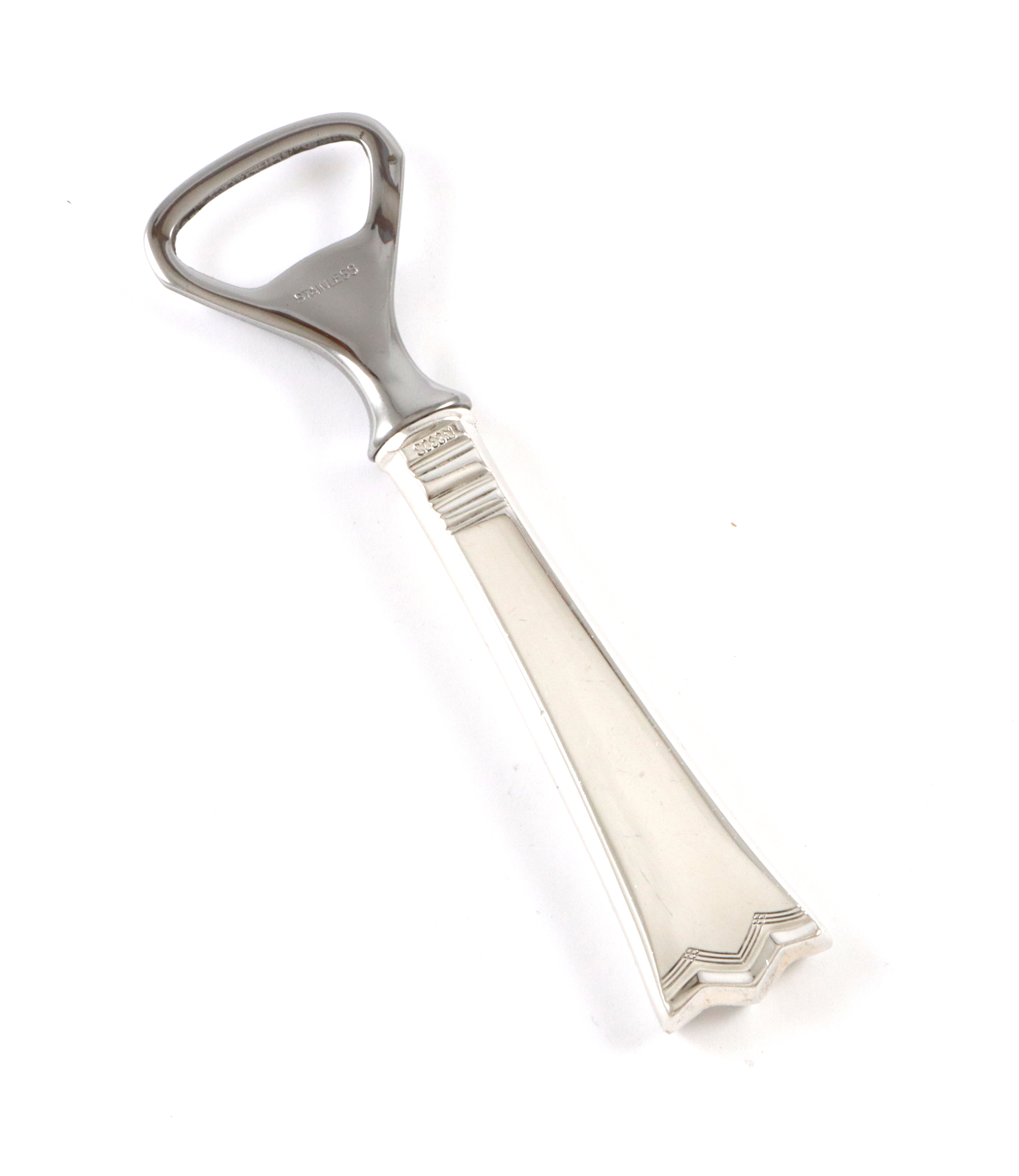 Kronesølv flaskeåpner i sølv.